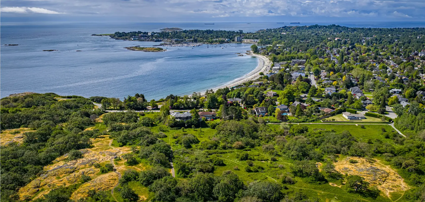 Homes along the shore of Oak Bay, seen from the air